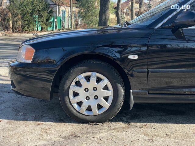 Черный Киа Маджентис, объемом двигателя 2 л и пробегом 223 тыс. км за 3990 $, фото 10 на Automoto.ua