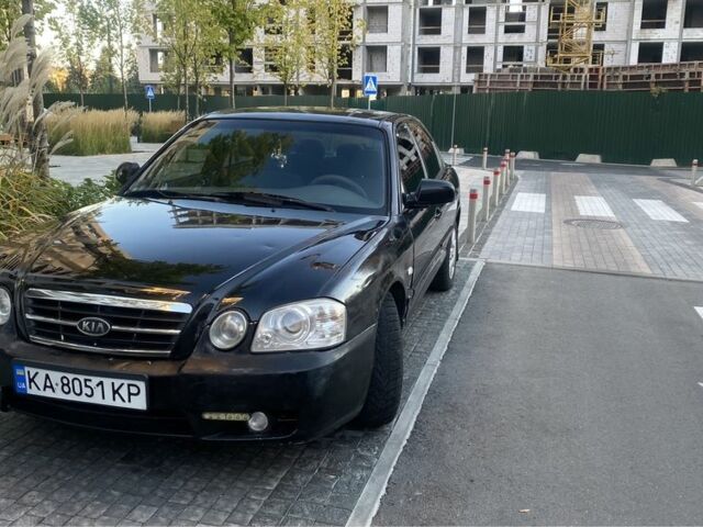 Чорний Кіа Маджентіс, об'ємом двигуна 2 л та пробігом 229 тис. км за 3650 $, фото 1 на Automoto.ua
