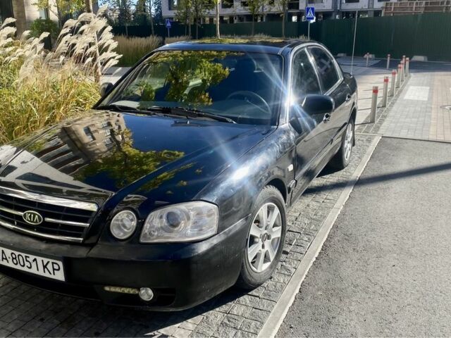 Чорний Кіа Маджентіс, об'ємом двигуна 2 л та пробігом 229 тис. км за 3650 $, фото 14 на Automoto.ua