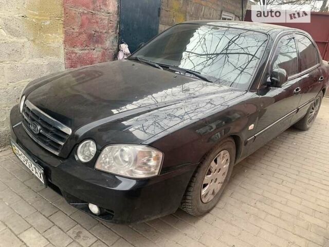 Черный Киа Маджентис, объемом двигателя 2 л и пробегом 161 тыс. км за 4800 $, фото 1 на Automoto.ua