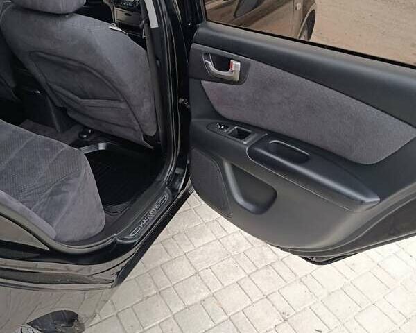 Черный Киа Маджентис, объемом двигателя 2 л и пробегом 244 тыс. км за 5500 $, фото 9 на Automoto.ua