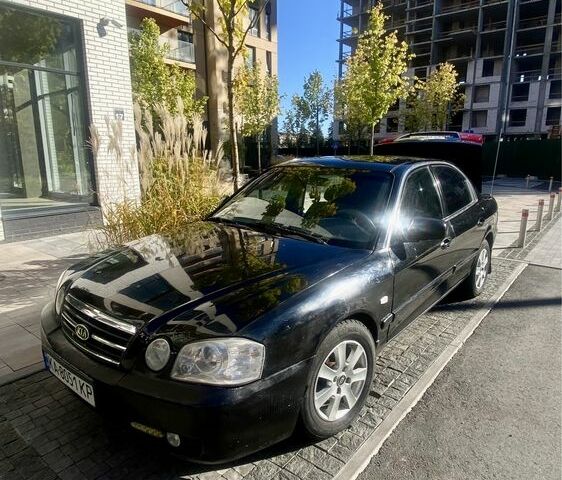 Чорний Кіа Маджентіс, об'ємом двигуна 2 л та пробігом 229 тис. км за 3650 $, фото 11 на Automoto.ua