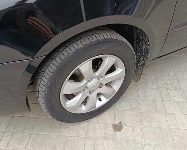 Черный Киа Маджентис, объемом двигателя 2 л и пробегом 244 тыс. км за 5500 $, фото 27 на Automoto.ua