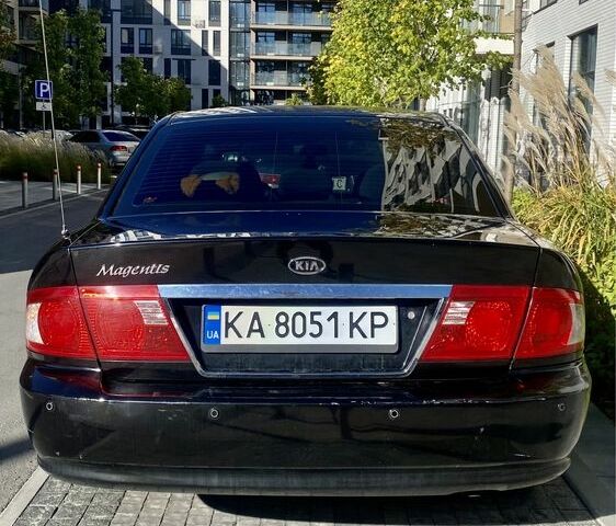 Чорний Кіа Маджентіс, об'ємом двигуна 2 л та пробігом 229 тис. км за 3650 $, фото 13 на Automoto.ua