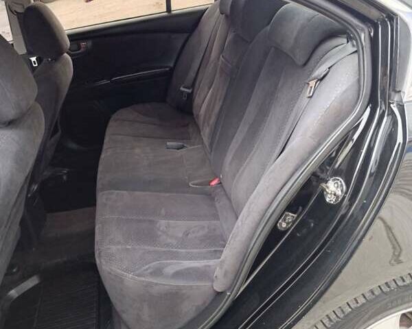 Черный Киа Маджентис, объемом двигателя 2 л и пробегом 244 тыс. км за 5500 $, фото 19 на Automoto.ua
