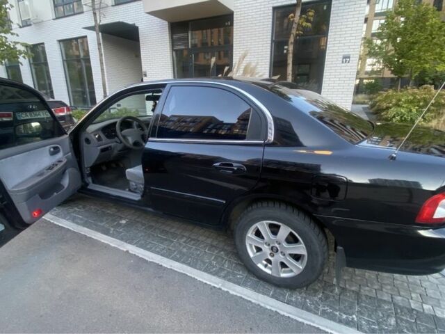 Чорний Кіа Маджентіс, об'ємом двигуна 2 л та пробігом 229 тис. км за 3650 $, фото 2 на Automoto.ua