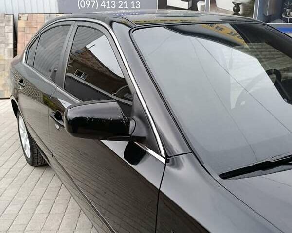 Черный Киа Маджентис, объемом двигателя 2 л и пробегом 244 тыс. км за 5500 $, фото 4 на Automoto.ua