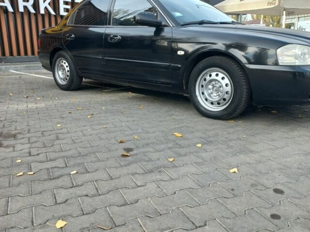 Чорний Кіа Маджентіс, об'ємом двигуна 2 л та пробігом 195 тис. км за 3500 $, фото 2 на Automoto.ua