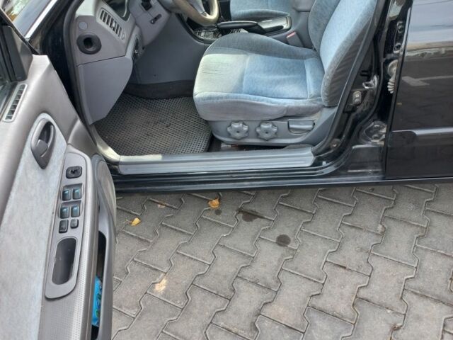 Чорний Кіа Маджентіс, об'ємом двигуна 2 л та пробігом 195 тис. км за 3500 $, фото 6 на Automoto.ua