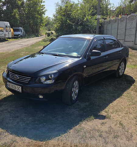 Чорний Кіа Маджентіс, об'ємом двигуна 2 л та пробігом 217 тис. км за 6100 $, фото 1 на Automoto.ua