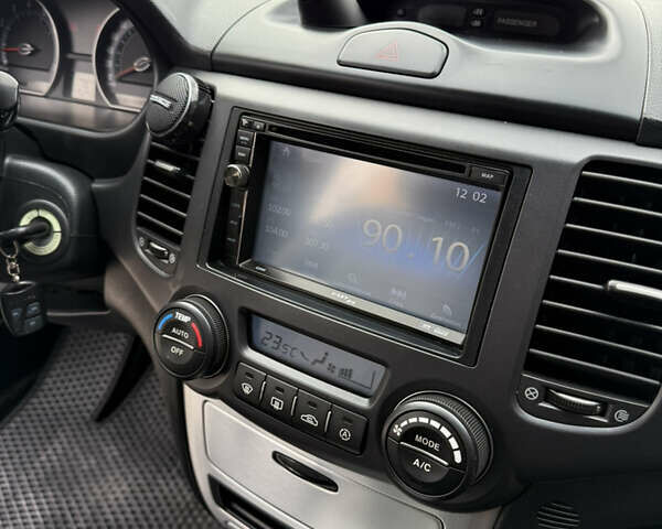 Чорний Кіа Маджентіс, об'ємом двигуна 2 л та пробігом 217 тис. км за 5999 $, фото 23 на Automoto.ua