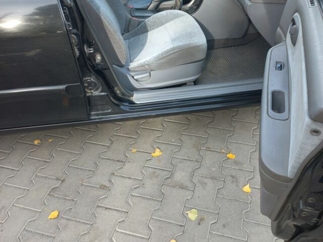 Чорний Кіа Маджентіс, об'ємом двигуна 2 л та пробігом 195 тис. км за 3500 $, фото 8 на Automoto.ua