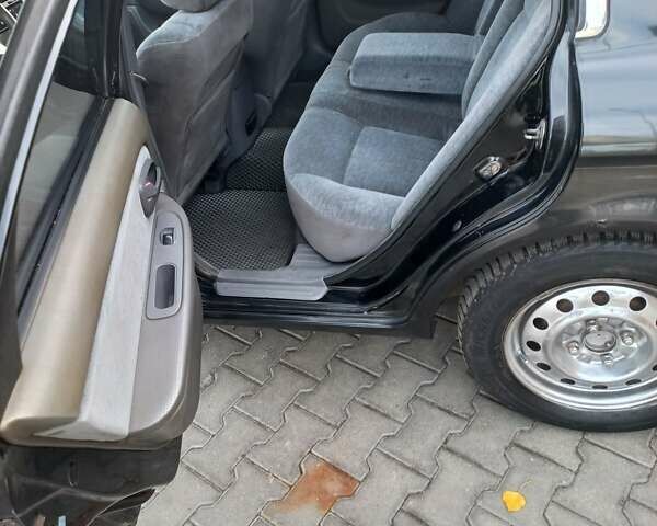 Черный Киа Маджентис, объемом двигателя 1.99 л и пробегом 195 тыс. км за 3200 $, фото 7 на Automoto.ua