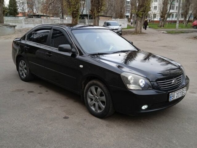 Чорний Кіа Маджентіс, об'ємом двигуна 2 л та пробігом 292 тис. км за 5400 $, фото 1 на Automoto.ua