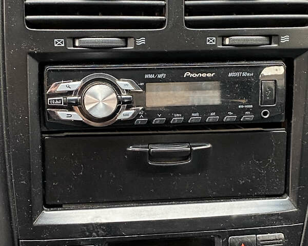 Чорний Кіа Маджентіс, об'ємом двигуна 2 л та пробігом 120 тис. км за 5800 $, фото 9 на Automoto.ua