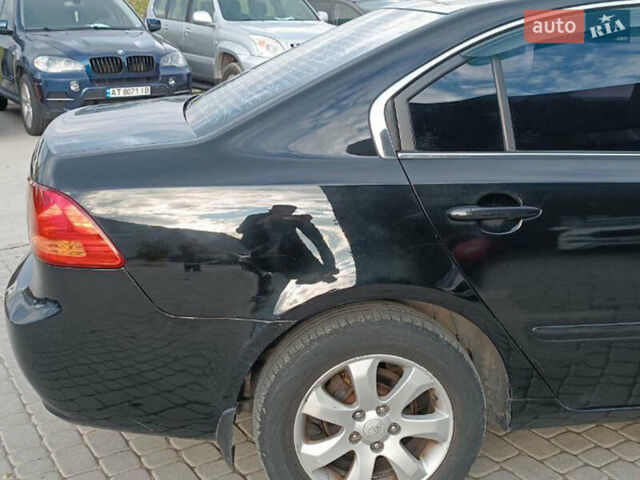 Чорний Кіа Маджентіс, об'ємом двигуна 2 л та пробігом 148 тис. км за 5450 $, фото 8 на Automoto.ua