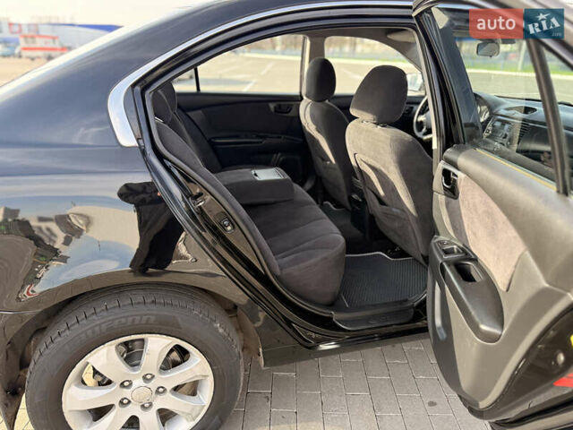 Черный Киа Маджентис, объемом двигателя 2 л и пробегом 260 тыс. км за 5400 $, фото 12 на Automoto.ua