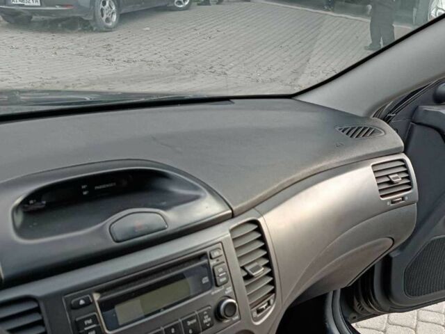 Чорний Кіа Маджентіс, об'ємом двигуна 2 л та пробігом 148 тис. км за 5450 $, фото 19 на Automoto.ua