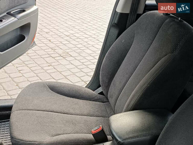 Чорний Кіа Маджентіс, об'ємом двигуна 2 л та пробігом 148 тис. км за 5450 $, фото 18 на Automoto.ua
