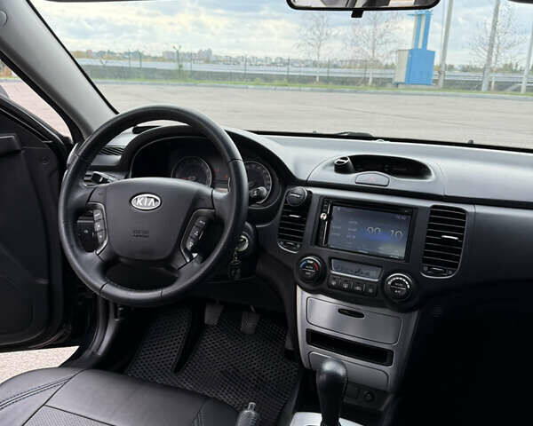 Чорний Кіа Маджентіс, об'ємом двигуна 2 л та пробігом 217 тис. км за 5999 $, фото 19 на Automoto.ua