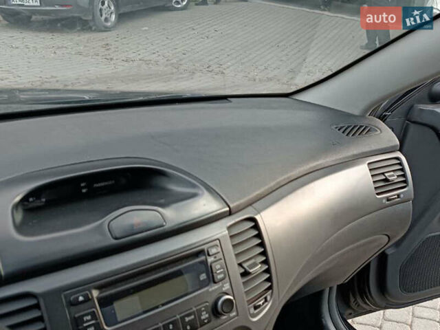 Чорний Кіа Маджентіс, об'ємом двигуна 2 л та пробігом 148 тис. км за 5450 $, фото 20 на Automoto.ua