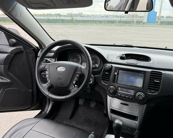 Чорний Кіа Маджентіс, об'ємом двигуна 2 л та пробігом 217 тис. км за 5999 $, фото 20 на Automoto.ua