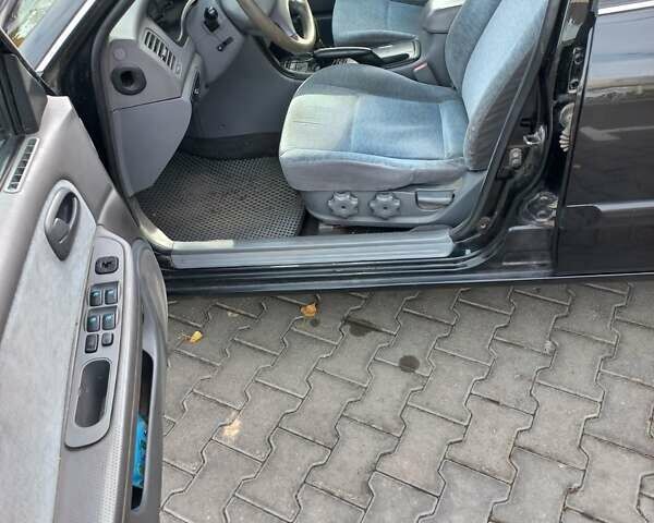 Черный Киа Маджентис, объемом двигателя 1.99 л и пробегом 195 тыс. км за 3200 $, фото 6 на Automoto.ua