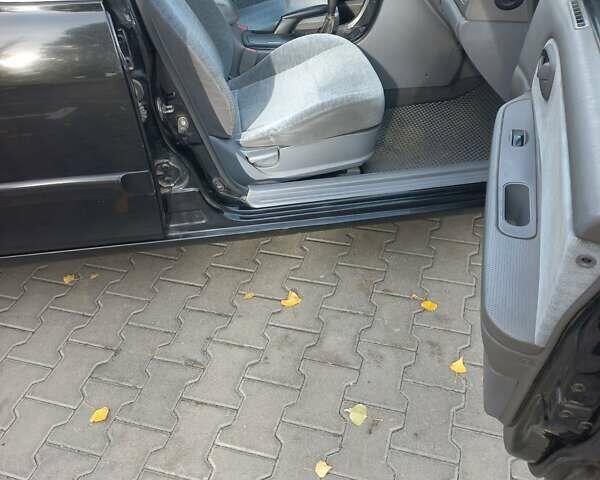 Черный Киа Маджентис, объемом двигателя 1.99 л и пробегом 195 тыс. км за 3200 $, фото 8 на Automoto.ua