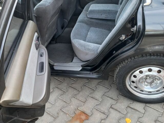 Чорний Кіа Маджентіс, об'ємом двигуна 2 л та пробігом 195 тис. км за 3500 $, фото 7 на Automoto.ua