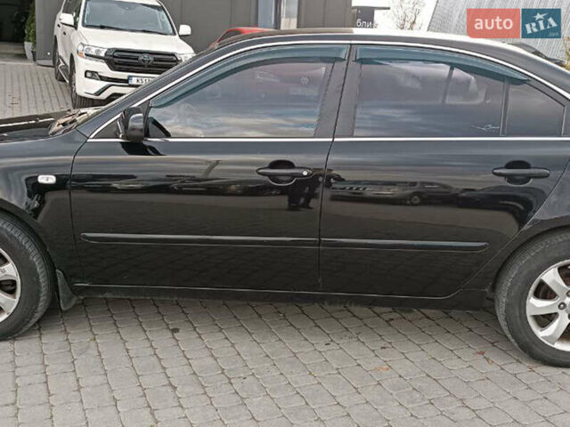 Чорний Кіа Маджентіс, об'ємом двигуна 2 л та пробігом 148 тис. км за 5450 $, фото 1 на Automoto.ua