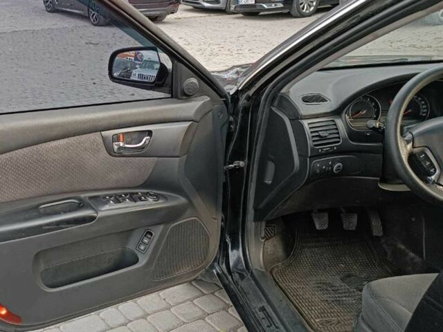Чорний Кіа Маджентіс, об'ємом двигуна 2 л та пробігом 148 тис. км за 5450 $, фото 11 на Automoto.ua