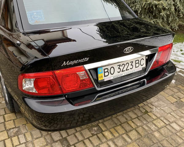 Чорний Кіа Маджентіс, об'ємом двигуна 2 л та пробігом 120 тис. км за 5800 $, фото 7 на Automoto.ua