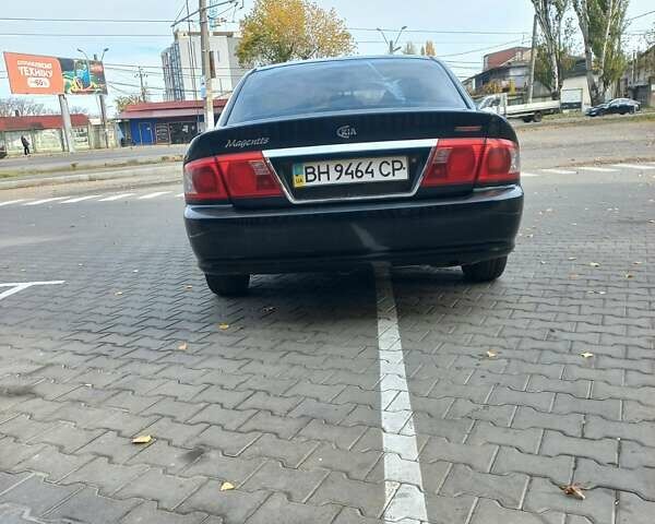 Черный Киа Маджентис, объемом двигателя 1.99 л и пробегом 195 тыс. км за 3200 $, фото 4 на Automoto.ua