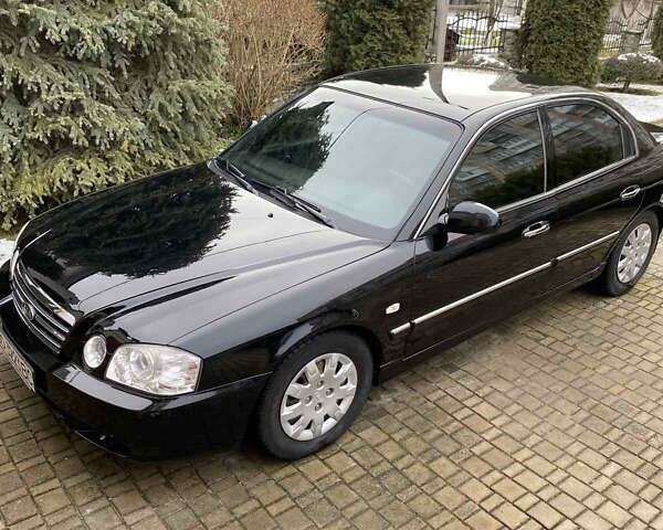 Чорний Кіа Маджентіс, об'ємом двигуна 2 л та пробігом 120 тис. км за 5800 $, фото 4 на Automoto.ua