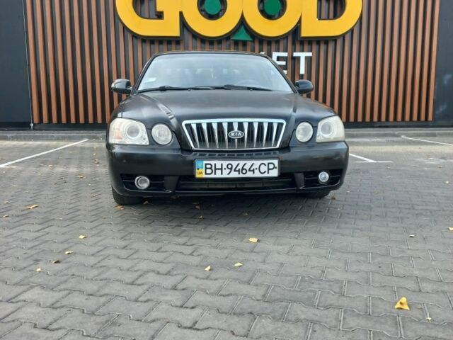 Чорний Кіа Маджентіс, об'ємом двигуна 2 л та пробігом 195 тис. км за 3500 $, фото 1 на Automoto.ua