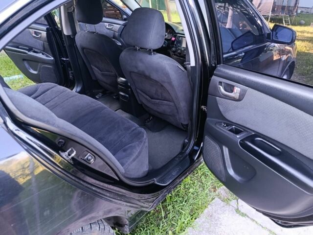 Черный Киа Маджентис, объемом двигателя 2 л и пробегом 240 тыс. км за 4150 $, фото 5 на Automoto.ua