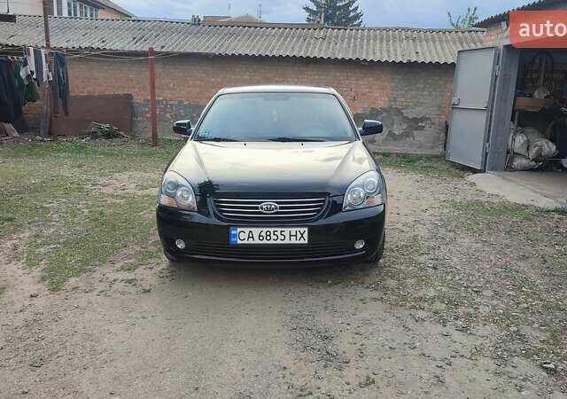 Черный Киа Маджентис, объемом двигателя 2 л и пробегом 200 тыс. км за 5200 $, фото 4 на Automoto.ua