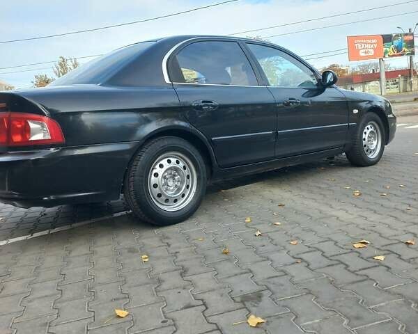 Черный Киа Маджентис, объемом двигателя 1.99 л и пробегом 195 тыс. км за 3200 $, фото 3 на Automoto.ua