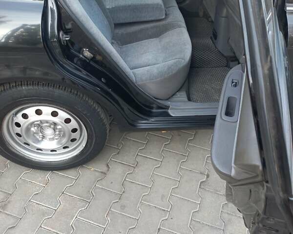 Черный Киа Маджентис, объемом двигателя 1.99 л и пробегом 195 тыс. км за 3200 $, фото 9 на Automoto.ua