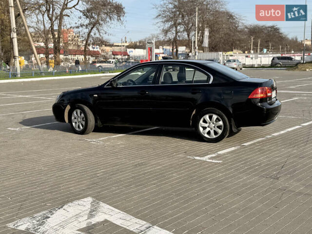 Черный Киа Маджентис, объемом двигателя 2 л и пробегом 260 тыс. км за 5400 $, фото 4 на Automoto.ua