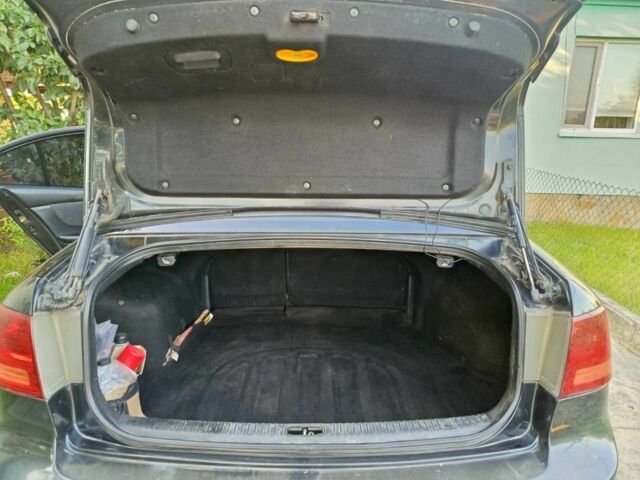 Черный Киа Маджентис, объемом двигателя 2 л и пробегом 240 тыс. км за 4150 $, фото 6 на Automoto.ua