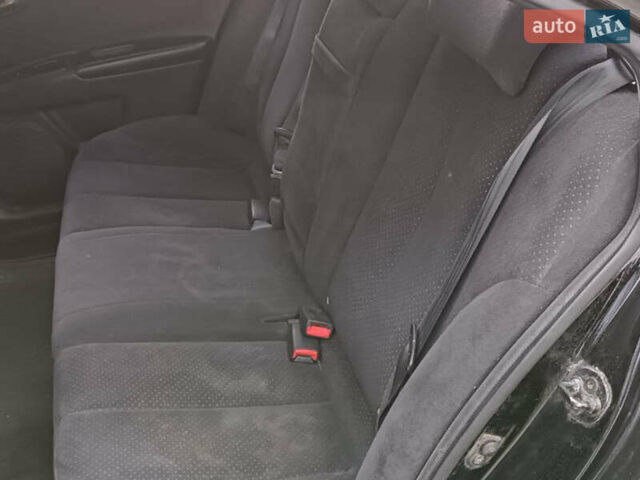 Чорний Кіа Маджентіс, об'ємом двигуна 2 л та пробігом 148 тис. км за 5450 $, фото 22 на Automoto.ua