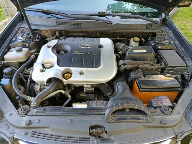 Черный Киа Маджентис, объемом двигателя 2 л и пробегом 240 тыс. км за 4150 $, фото 7 на Automoto.ua