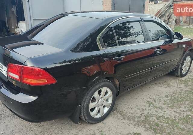 Черный Киа Маджентис, объемом двигателя 2 л и пробегом 200 тыс. км за 5200 $, фото 1 на Automoto.ua