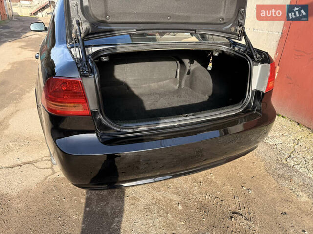 Черный Киа Маджентис, объемом двигателя 2 л и пробегом 260 тыс. км за 5400 $, фото 14 на Automoto.ua