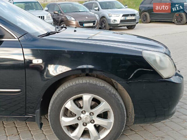 Чорний Кіа Маджентіс, об'ємом двигуна 2 л та пробігом 148 тис. км за 5450 $, фото 10 на Automoto.ua