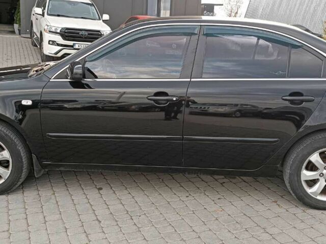 Чорний Кіа Маджентіс, об'ємом двигуна 2 л та пробігом 148 тис. км за 5450 $, фото 2 на Automoto.ua