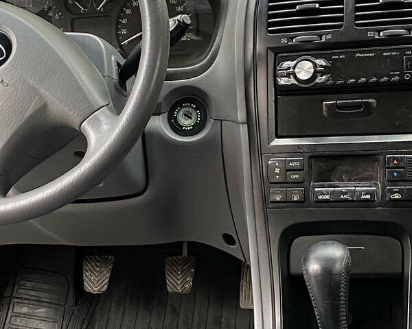 Чорний Кіа Маджентіс, об'ємом двигуна 2 л та пробігом 120 тис. км за 5800 $, фото 8 на Automoto.ua