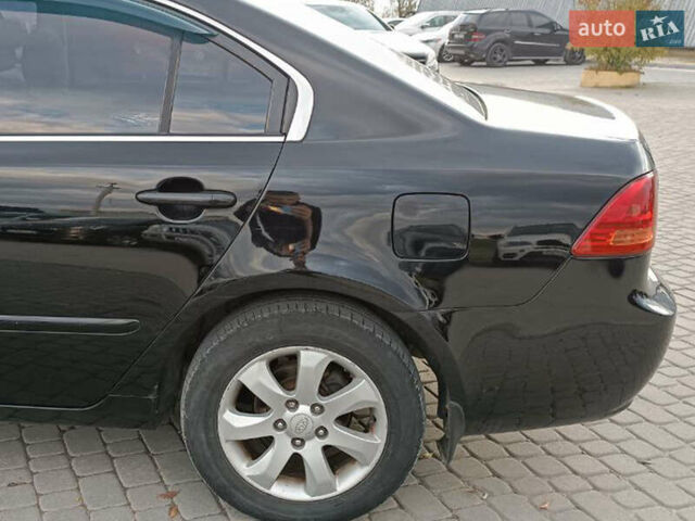 Чорний Кіа Маджентіс, об'ємом двигуна 2 л та пробігом 148 тис. км за 5450 $, фото 4 на Automoto.ua