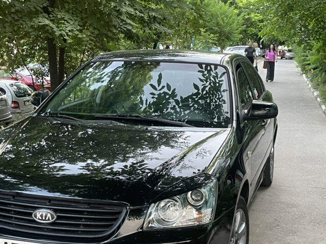 Чорний Кіа Маджентіс, об'ємом двигуна 2 л та пробігом 272 тис. км за 5300 $, фото 5 на Automoto.ua